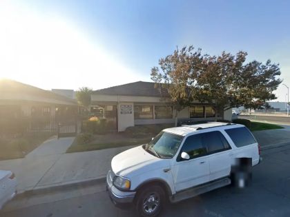 Street level view of the address for Dr. Catherine Irasusta in Fresno