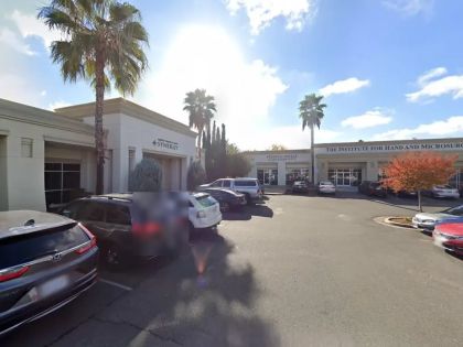 Street level view of the address for Necdet Ozder Dental in Fresno